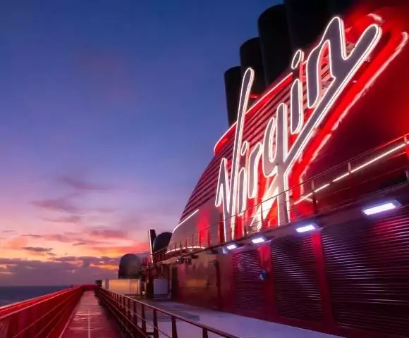 Virgin-Voyages-Exterior-Logo-580x480-1 https://spicyvacations.com/wp-content/uploads/2024/07/Virgin-Voyages-Exterior-Logo-580x480-1.jpg