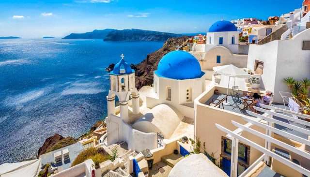Santorini Greece https://spicyvacations.com/wp-content/uploads/2024/08/Santorini-Greece-640x366.jpg
